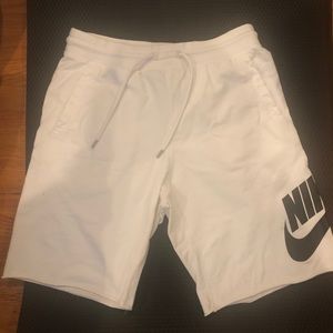 White Nike shorts